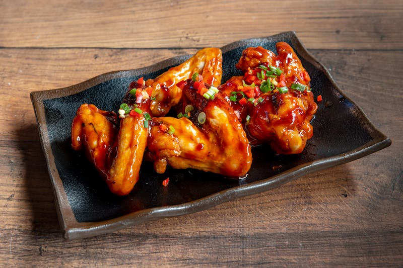Wings over kitchen and team at work